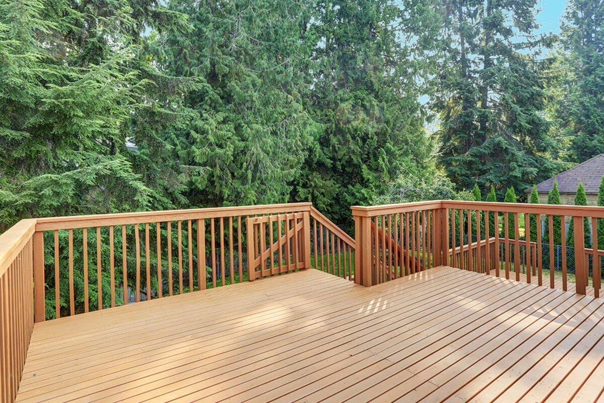Composite deck with a modern railing system