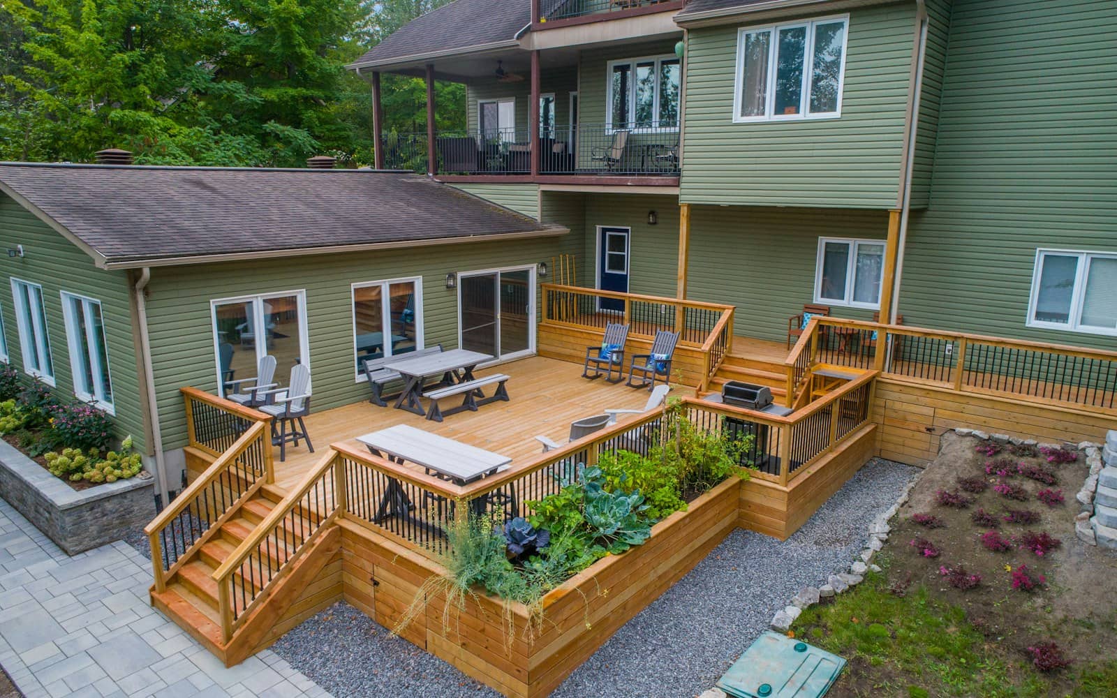 Large multi-level deck installation in a residential backyard